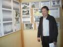 Christian shows the group the displays of information he has gathered about the eleven 301st B-17s lost on July 26, 1944