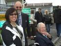 Tom and Gail Spencer prepare to move Bill to the Celebration Hall