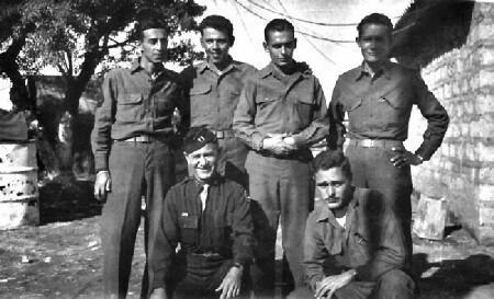 In the picture with the captain, I am on the top left. Next to me is Martin Shapiro. Next to him we called 