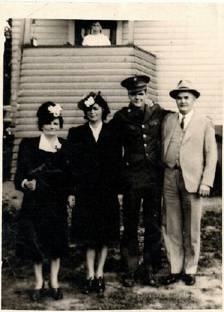 Harry with his Mother and Father and his sister, Virginia, to his right