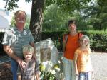 The Lilligren family visits the Memorial Plaque for two 32nd Squadron B-17s at the War Memorial in St. Jacob im Walde, Austria. 